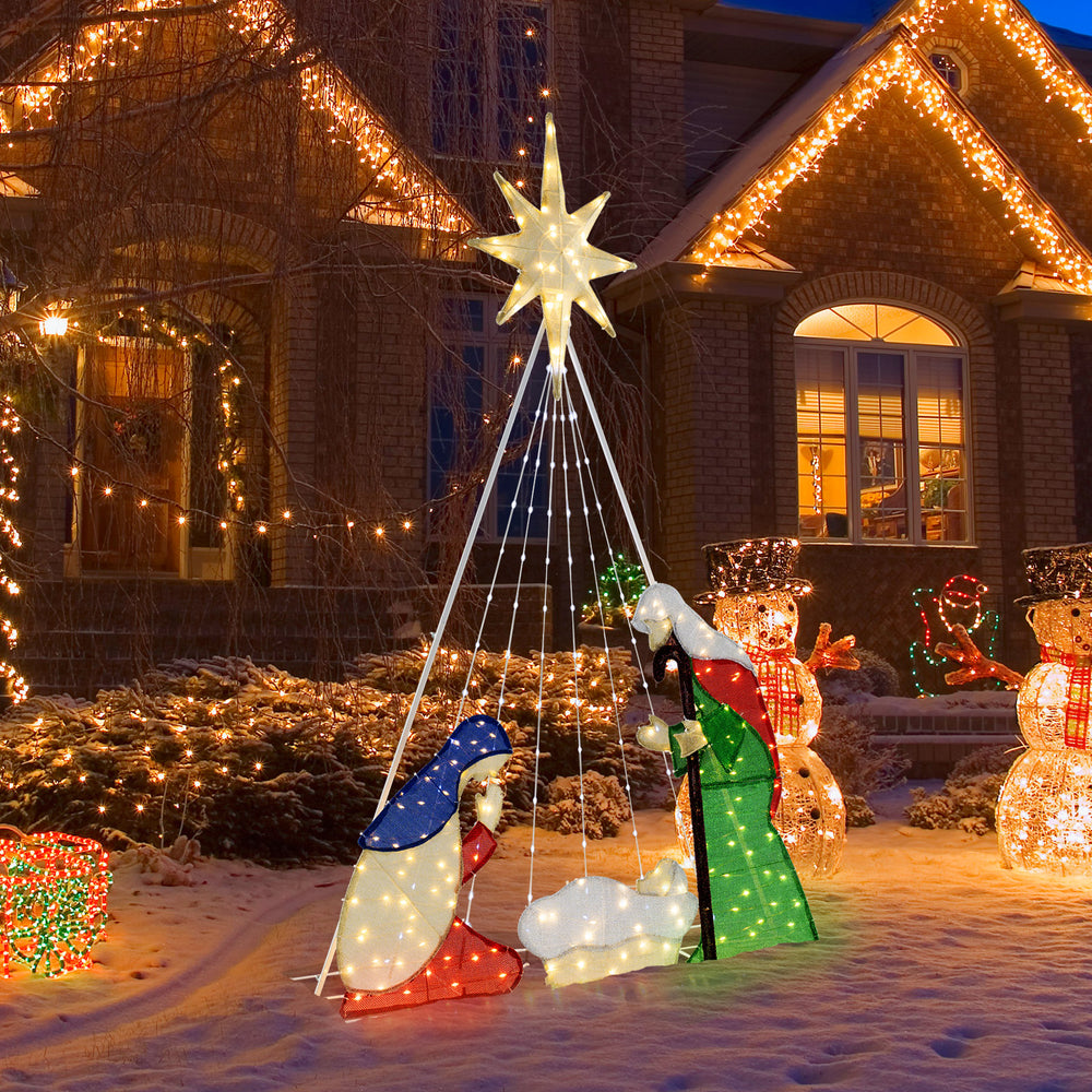 6 feet lighted nativity scene featuring Jesus, Mary, and Joseph with 240 LED lights for festive outdoor decoration.