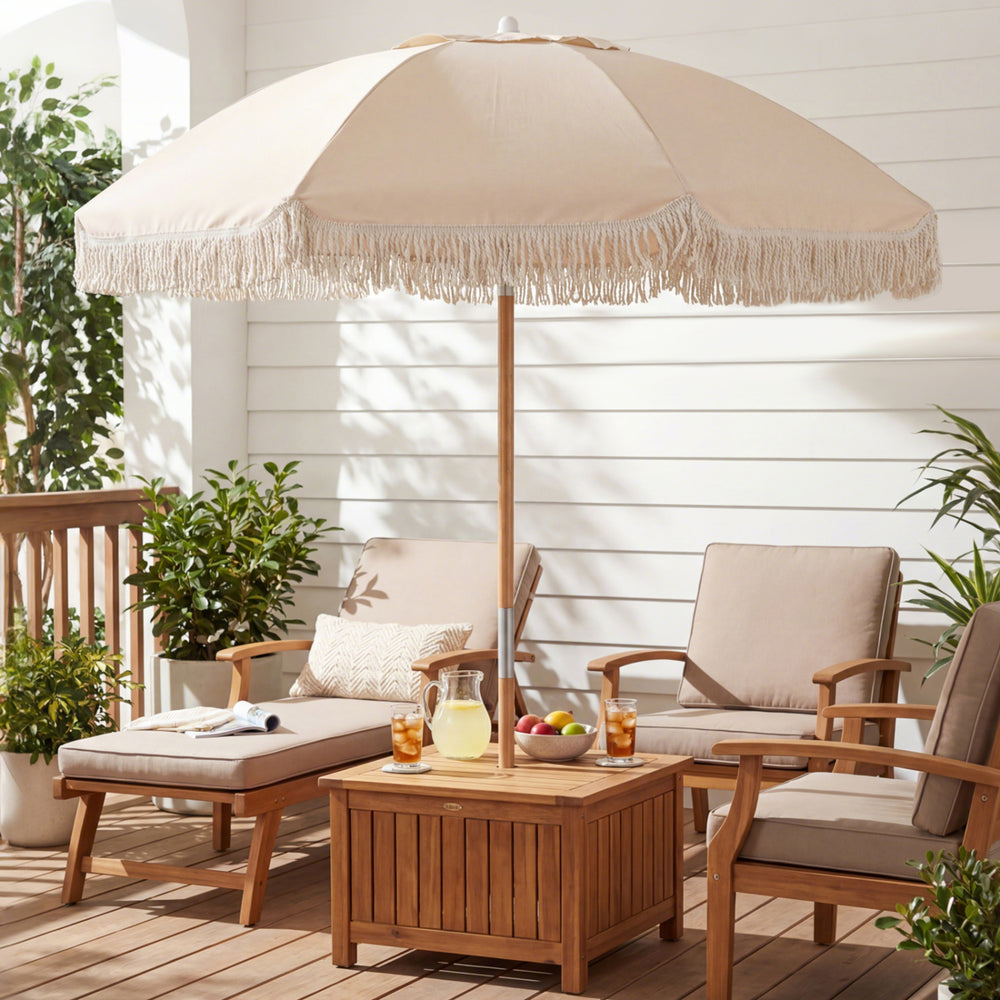 6 feet patio umbrella with fringe, wood pole, and push button tilt, providing stylish shade for outdoor relaxation.