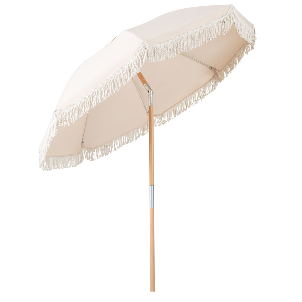 Side view of the 6 feet white patio umbrella with fringe and wood pole, showcasing its elegant design for outdoor.