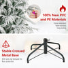 Snow-flocked branches of a 6-foot artificial Christmas tree with a stable metal base and warm white LED lights for.