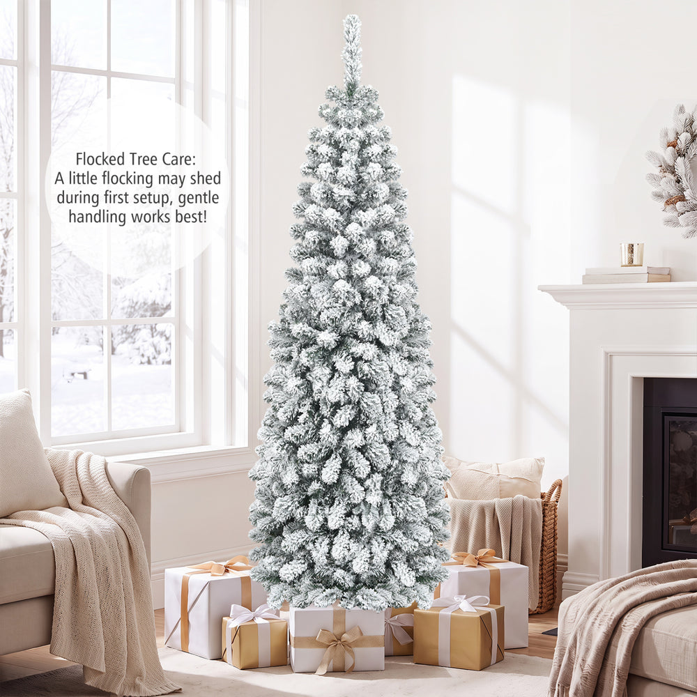 Snow flocked 6 feet unlit pencil Christmas tree with 500 branch tips, perfect for small corners and holiday decorations.