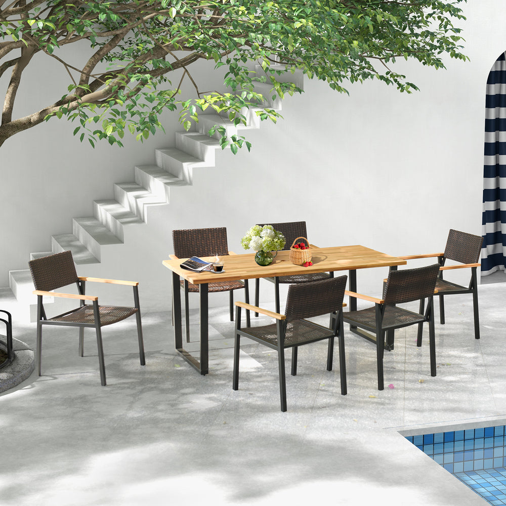 Rectangular 6-person acacia wood outdoor dining table with a 2-inch umbrella hole, set in a stylish patio setting.