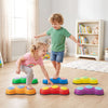 Colorful 6-piece stepping stones for kids with peanut designs, promoting motor skills and safe play on various surfaces.