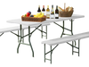 Portable 6 ft folding table with white HDPE tabletop and sturdy metal legs, ideal for outdoor picnics and gatherings.