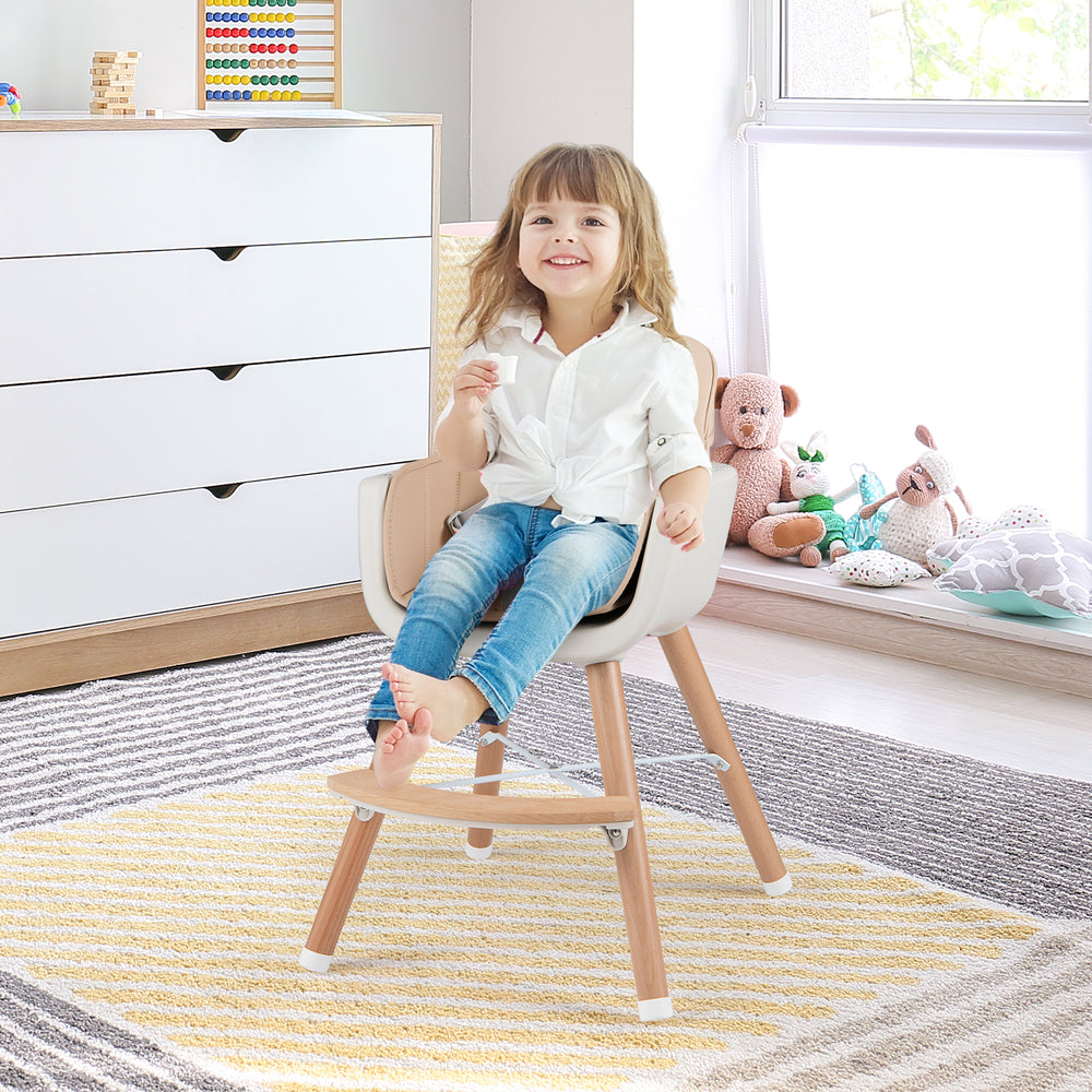 Convertible wooden highchair in light brown with safety harness, adjustable legs, and cozy PU cushion for mealtime.