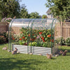 Galvanized raised garden bed with greenhouse cover, featuring clear PVC for warmth and animal protection, ideal for.