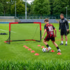Portable 6 x 4 FT soccer goal set with target and cones for skill development and practice in outdoor play.