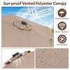 Vented tan polyester canopy of a 7.5 feet solar-powered patio umbrella, showcasing durability and sun protection.