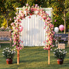 Wooden garden arch arbor adorned with pink roses, perfect for weddings or climbing plants in outdoor settings.