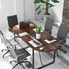 Oval 71-inch rustic brown executive table with cable management hole, ideal for office meetings and training rooms.