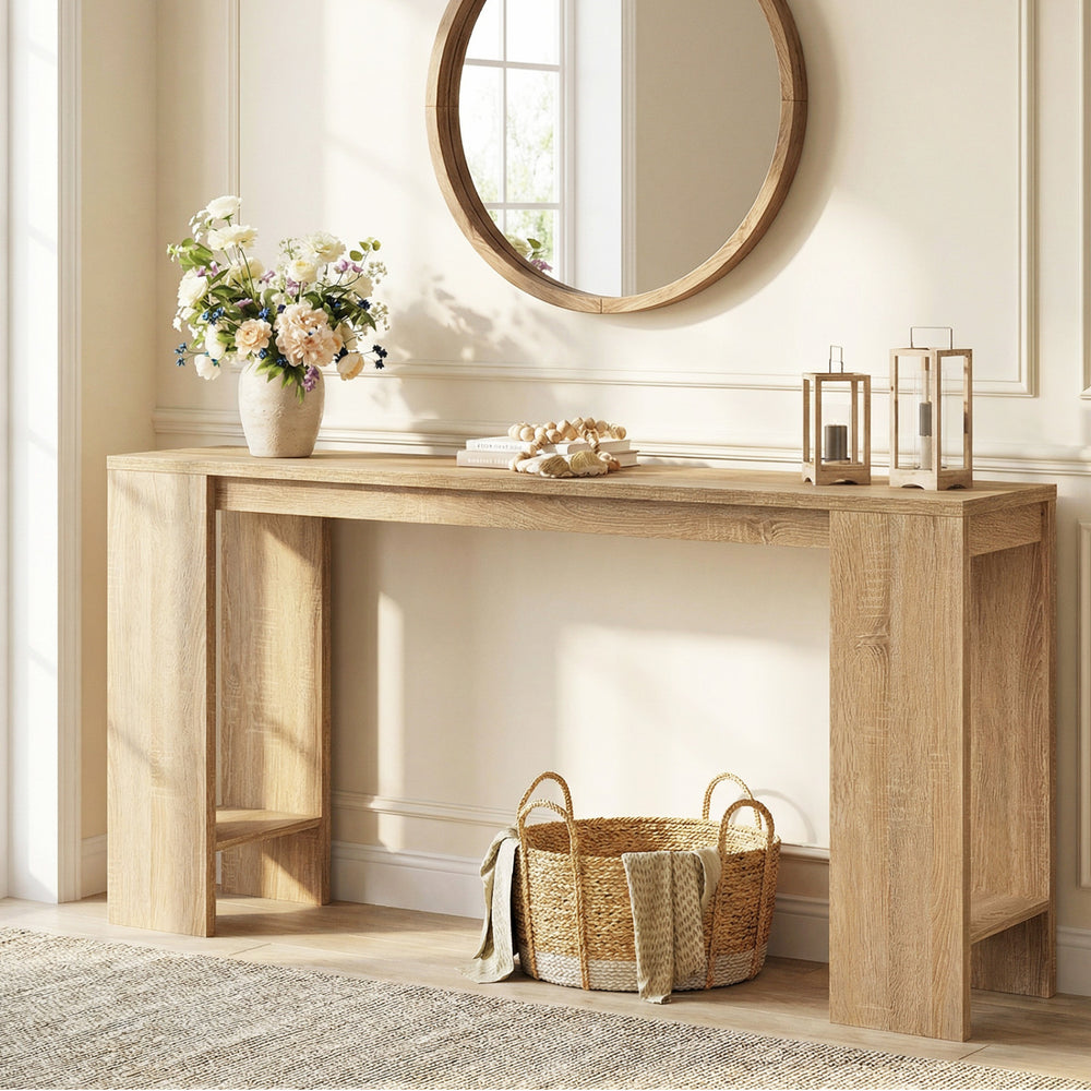 Natural wood 71-inch console table with open storage, ideal for displaying decor in a stylish hallway or foyer.