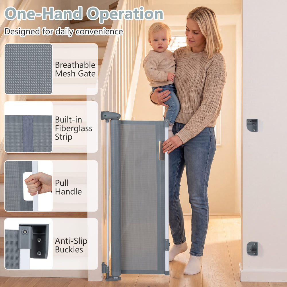 Retractable baby and dog gate, 71" wide and 33.5" tall, features one-hand operation and anti-slip buckles for secure use.