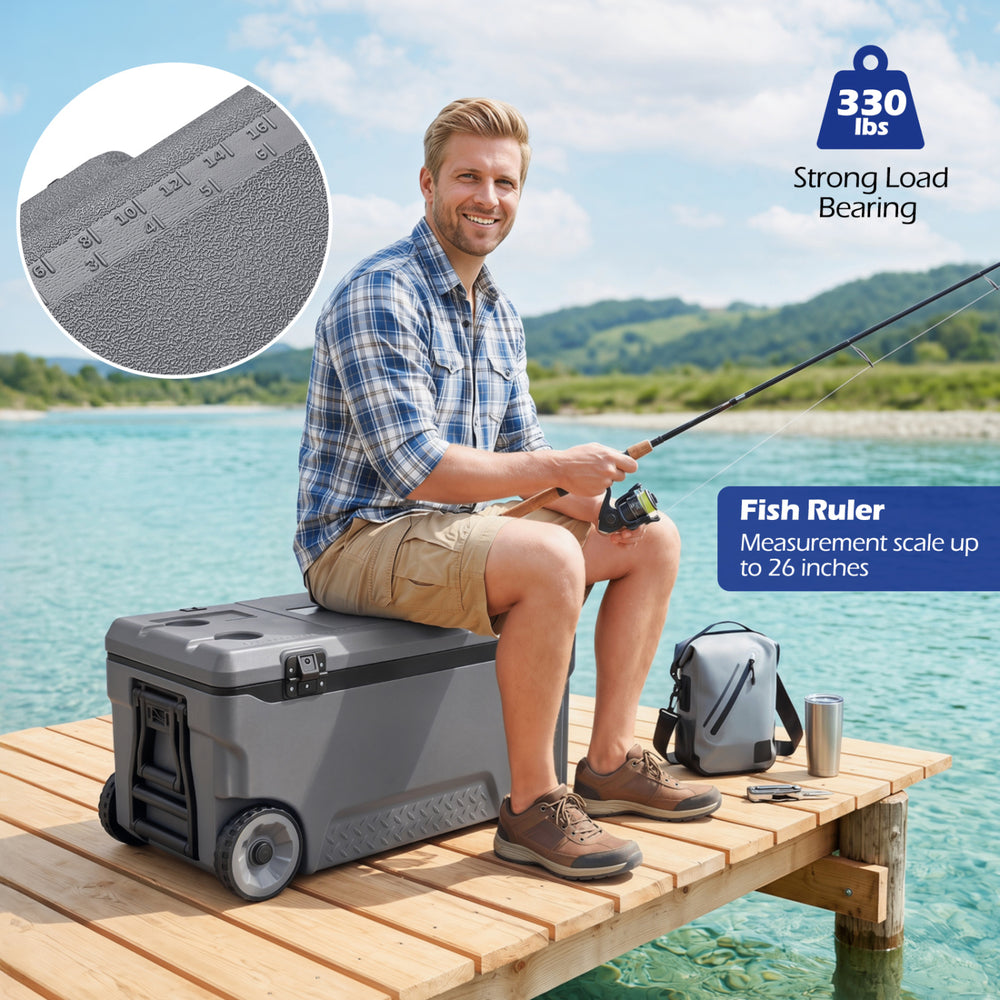 Portable 74 quart gray rolling cooler features a fish ruler, sturdy design, and holds up to 123 cans for outdoor activities.