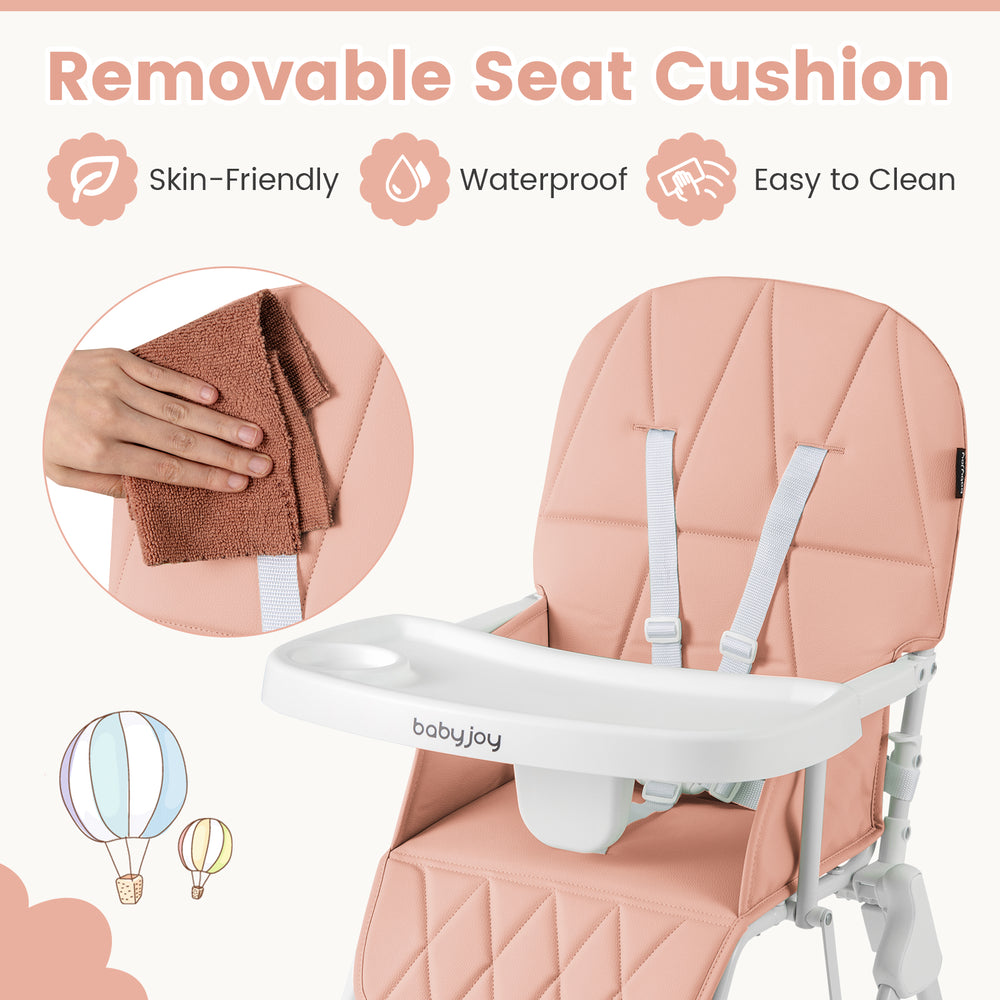 Removable pink PU seat cushion of the Easy Clean Compact Highchair with adjustable tray for convenient feeding.