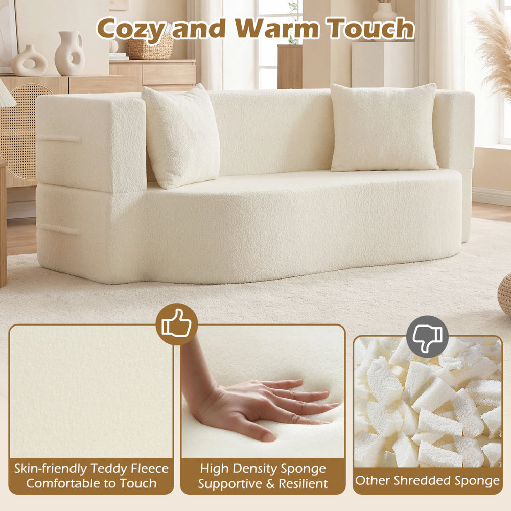 Folding sofa bed in beige with teddy fleece cover, featuring two pillows for comfort and ergonomic support.
