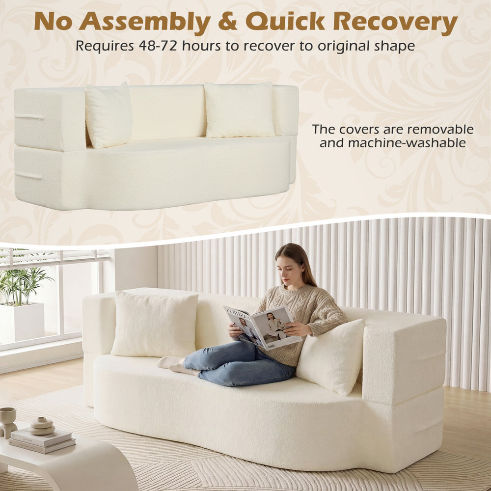 Folding sofa bed in beige with teddy fleece cover, includes two pillows, ideal for versatile seating or sleeping.