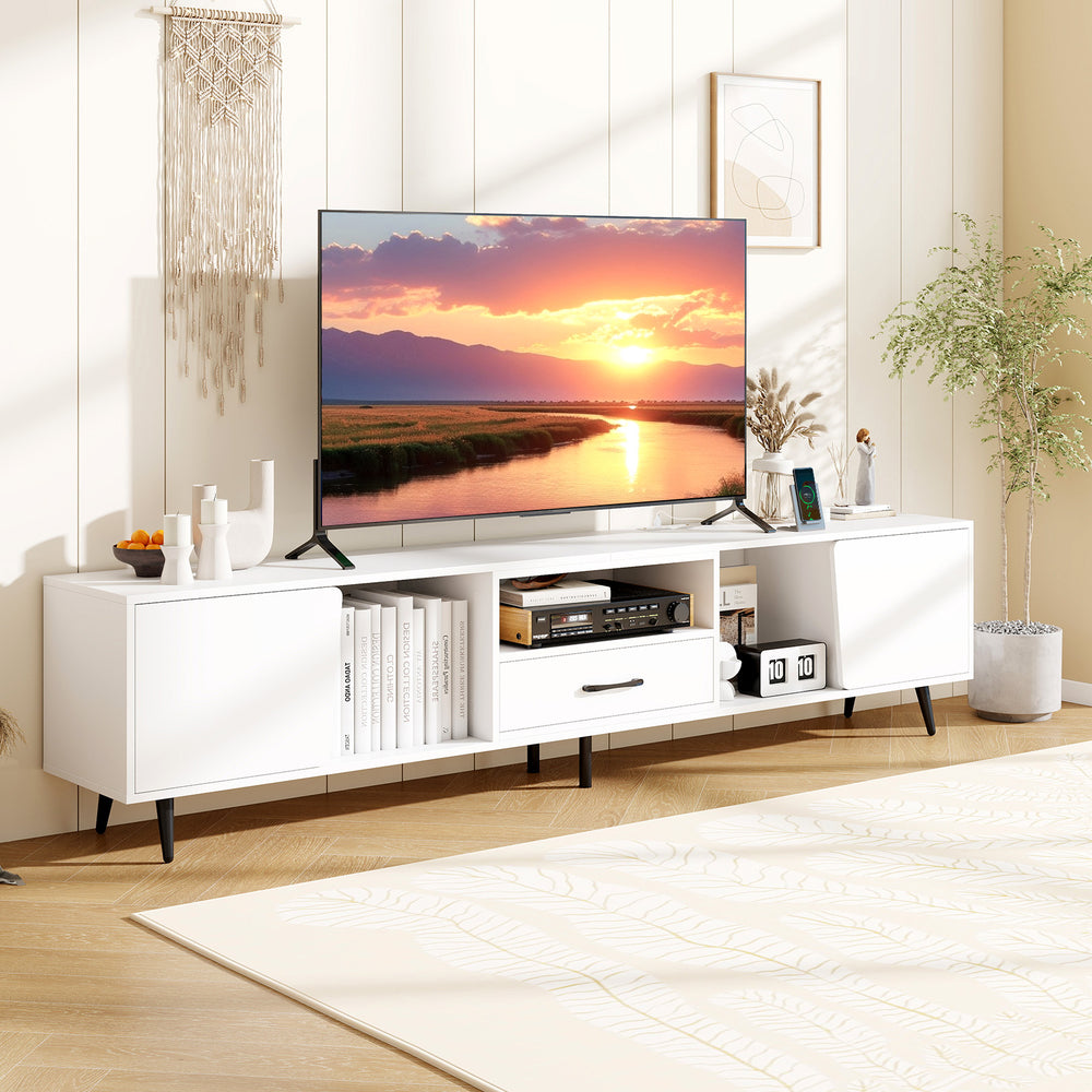 Modern 79" white TV stand with storage cabinets and built-in charging station, designed for TVs up to 90 inches.