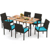 7-piece outdoor dining set featuring an acacia wood table and turquoise cushions, perfect for patio gatherings.