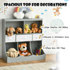 Freestanding gray cubby bin storage organizer with two shelves, three drawers, and three bins for toys and books.