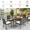 7-piece patio rattan dining set with cushioned armchairs and acacia wood table, perfect for outdoor gatherings.