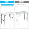 Folding cleaning sink table with sprayer, durable plastic, integrated drain, perfect for outdoor cleaning tasks.