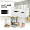 Shoe storage bench with removable cushion seat in white, ideal for entryway and hallway organization.
