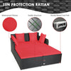 Spacious outdoor rattan daybed with red upholstered cushions, featuring a sturdy structure and waterproof pillows for.