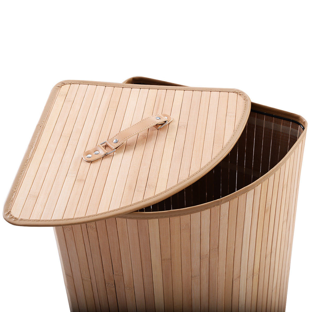 Bamboo laundry hamper with a thickened lid and PU leather handle, featuring a removable liner for odor prevention.