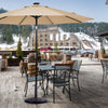 Heavy-duty 30lbs outdoor patio umbrella base with decorative bronze finish, securely holding an umbrella in place.