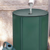 Portable 53-gallon collapsible rain barrel with zippered mesh cover for collecting rainwater in the garden.
