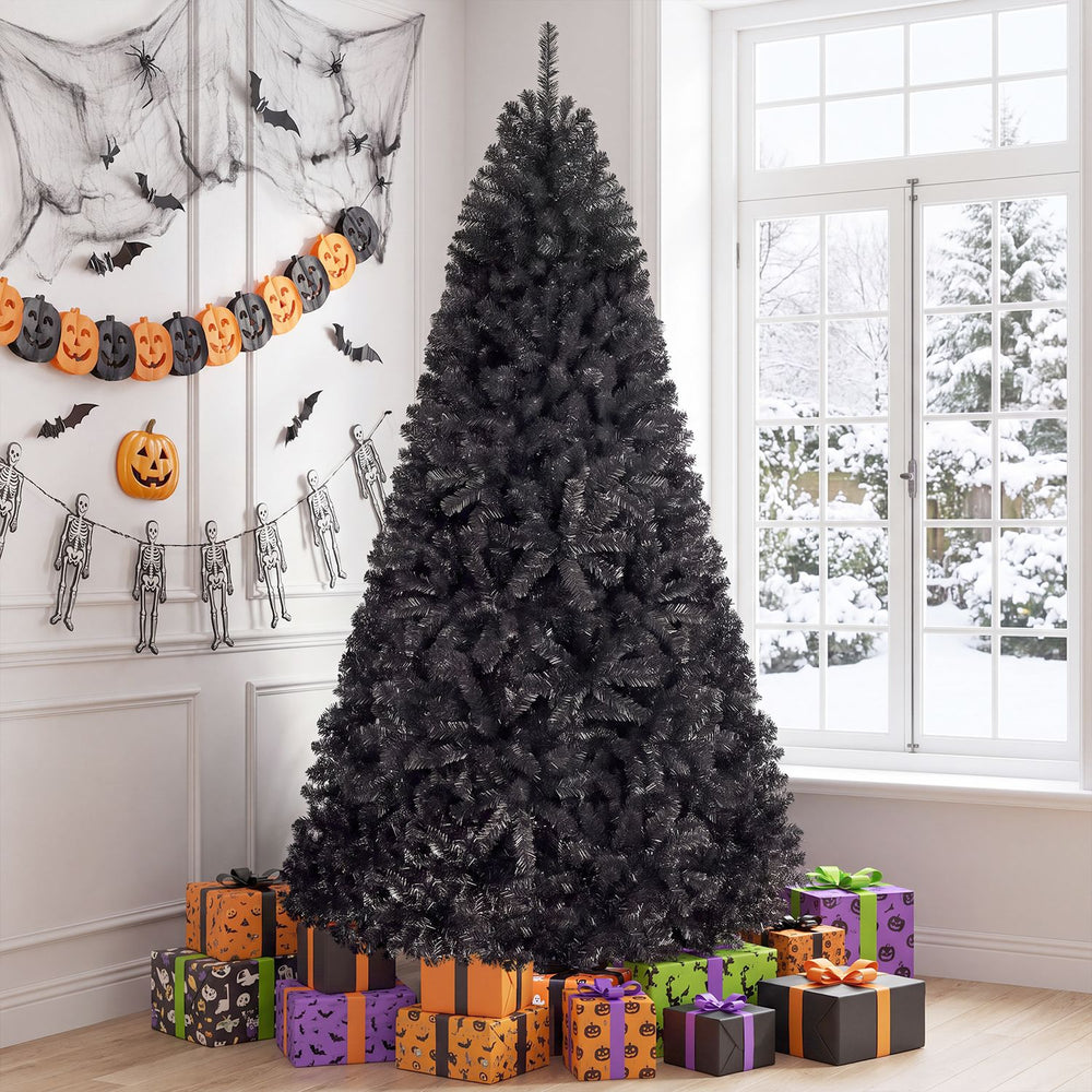 Black 7.5 feet hinged artificial Halloween Christmas tree with 1258 branch tips, perfect for festive holiday decoration.