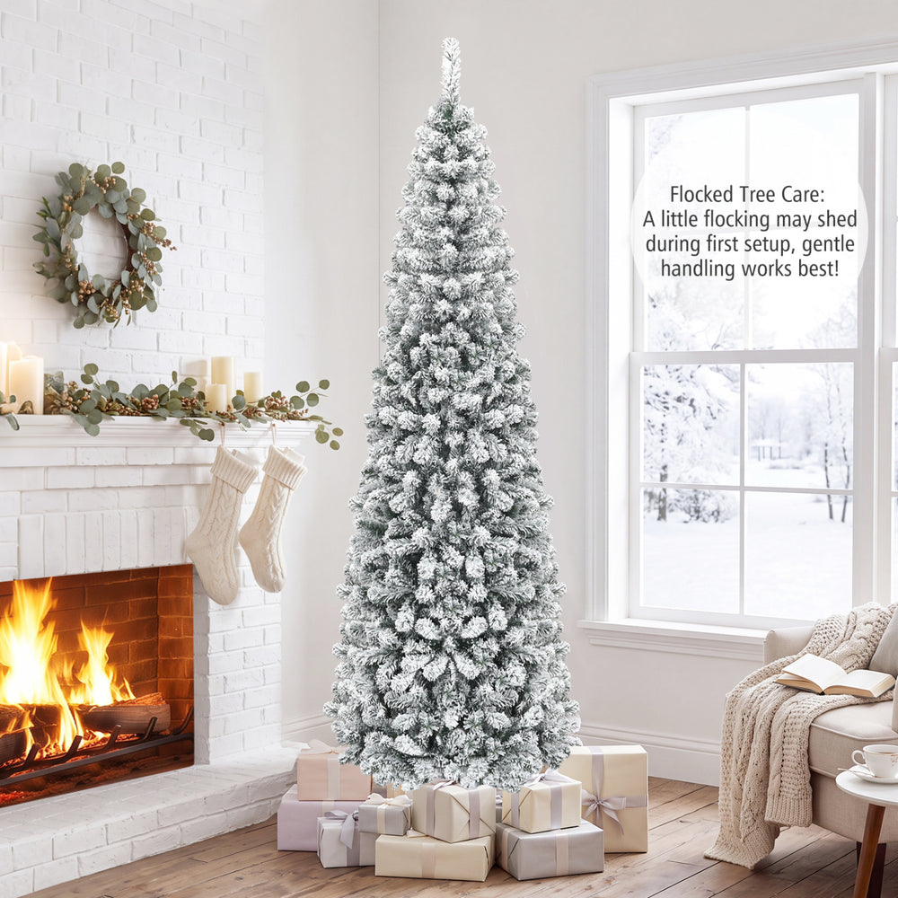 Snow flocked 7.5 feet unlit pencil Christmas tree with 641 tips, perfect for small corners and cozy holiday decorations.