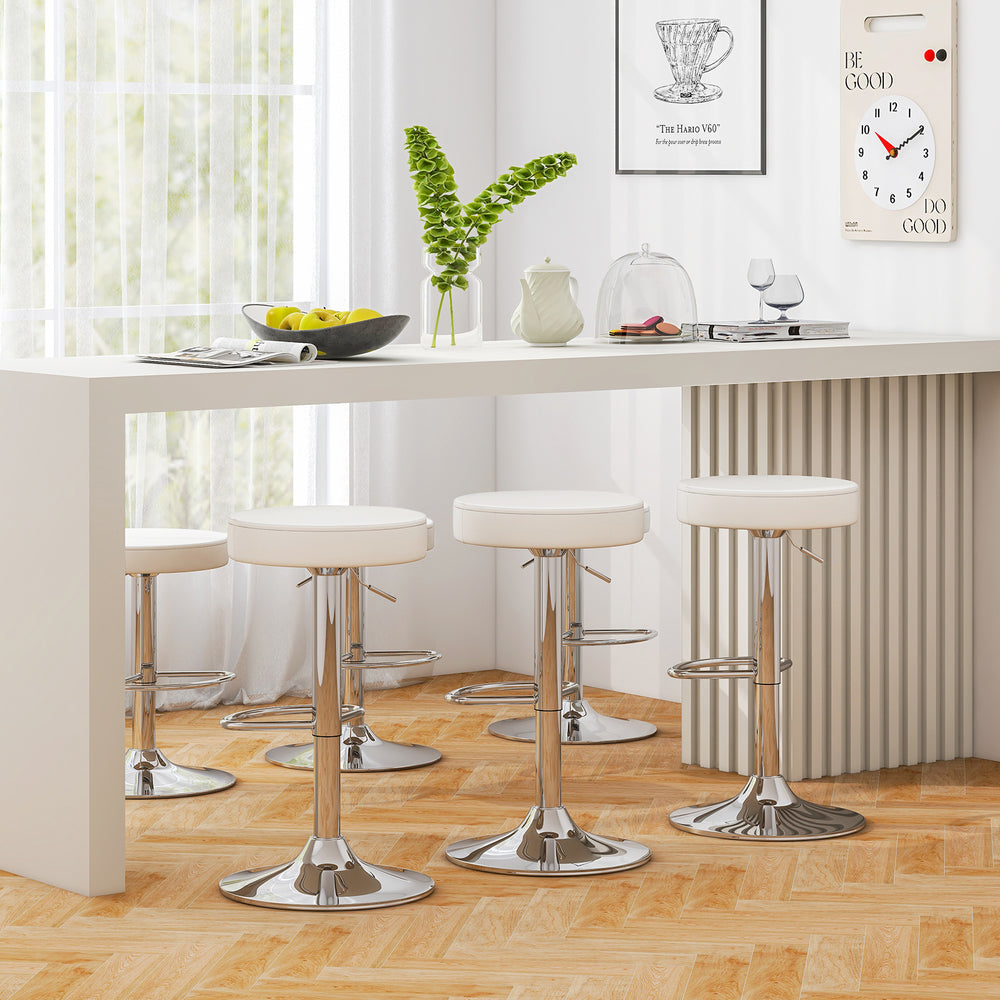 White PU leather swivel barstools with chrome footrest, adjustable height, perfect for modern bar seating.