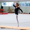 Folding balance beam in khaki with removable suede cover, ideal for home gymnastics training and easy storage.