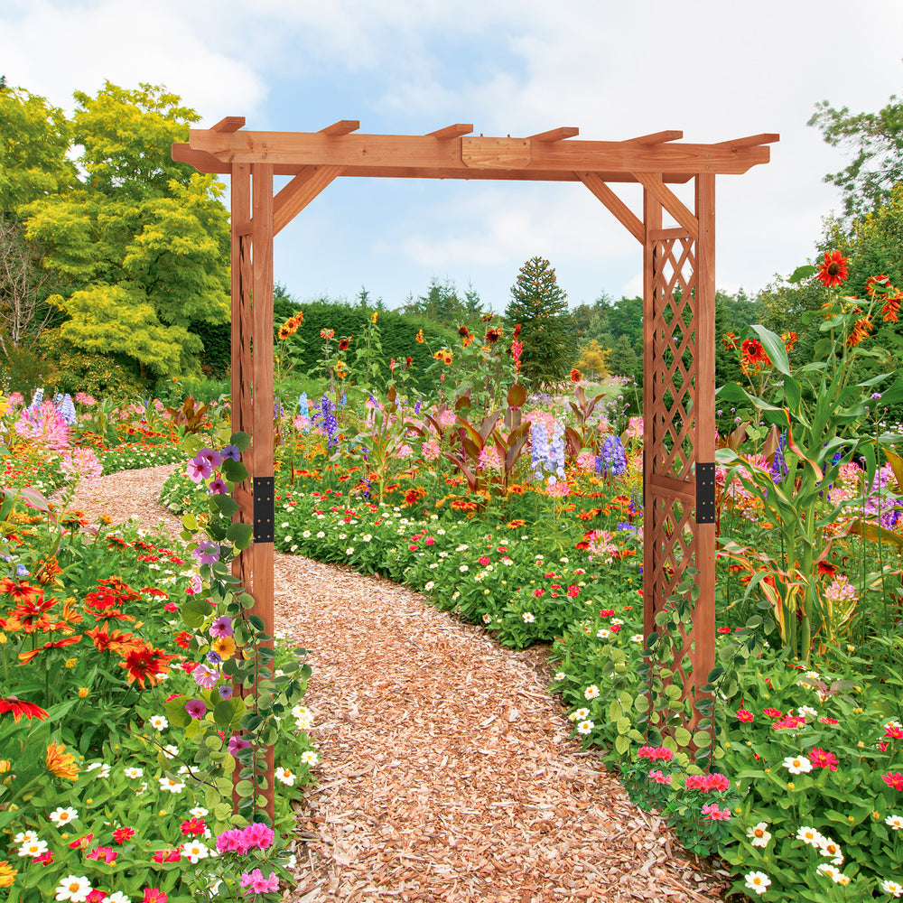 7 feet wooden high arbor arch with lattice panels, perfect for supporting climbing plants in a vibrant garden setting.