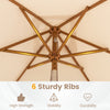 The underside view of the 7 feet beige patio umbrella showcases its 6 sturdy ribs for enhanced stability and durability.