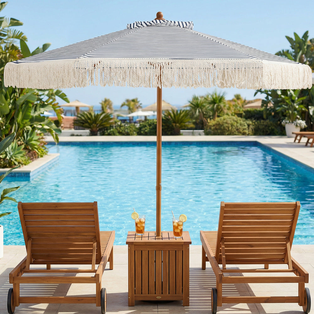 7 feet patio umbrella with fringe and bold stripes, featuring a boho tassel design for stylish sun protection by the.