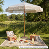 7 feet patio umbrella with boho tassel design and bold stripes, perfect for outdoor gatherings and sun protection.