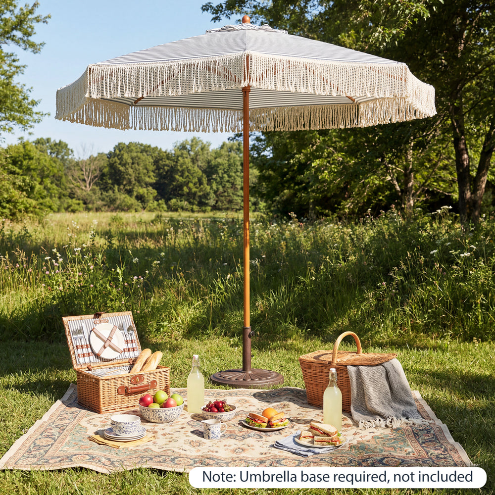7 feet patio umbrella with boho tassel design and bold stripes, perfect for outdoor gatherings and sun protection.