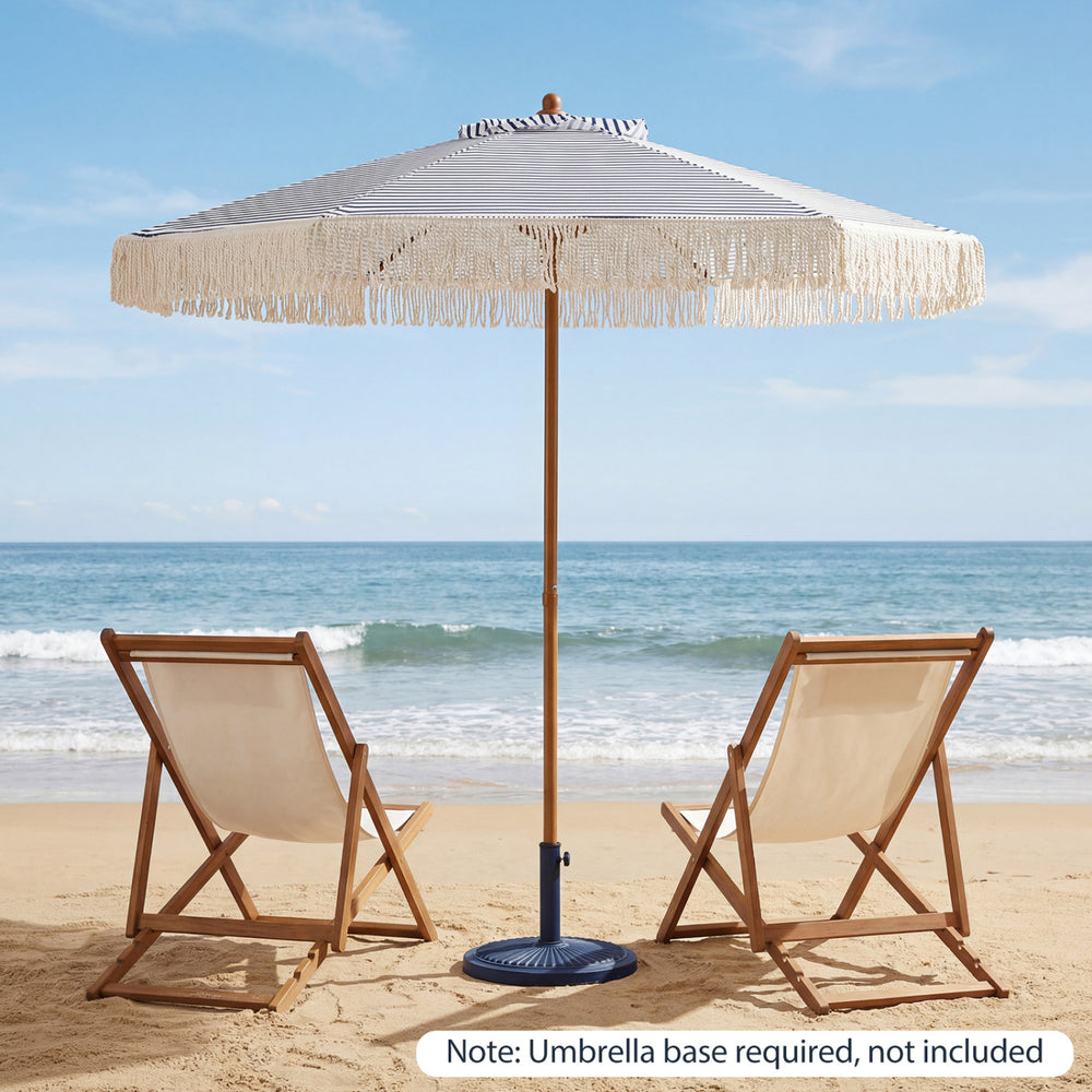 7-foot blue patio umbrella with fringe and tassels, featuring a sturdy aluminum pole, perfect for beach relaxation.