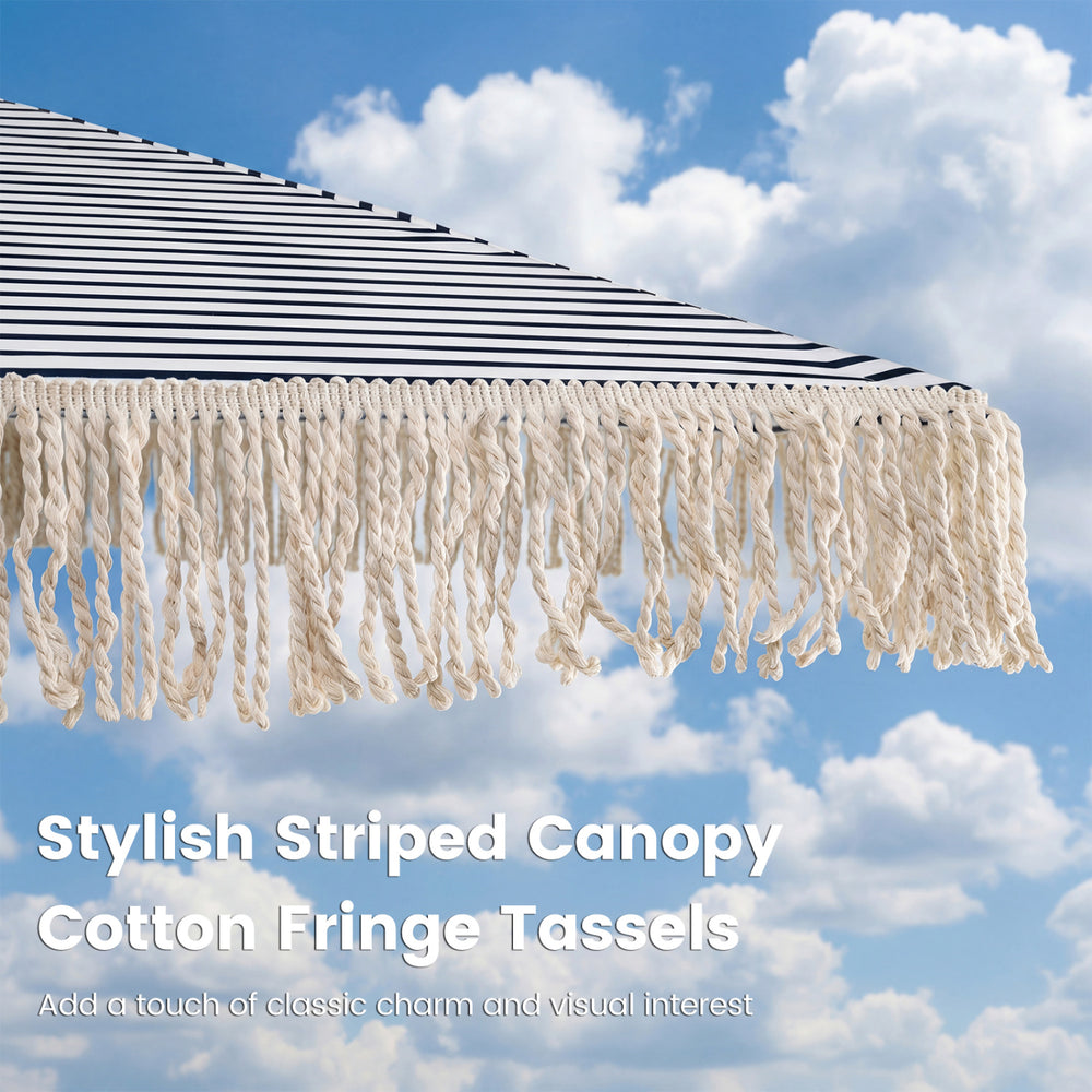7 feet patio umbrella with blue striped canopy and cotton fringe tassels, perfect for beach or outdoor gatherings.
