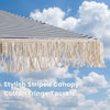 7 feet patio umbrella with blue striped canopy and cotton fringe tassels, perfect for beach or outdoor gatherings.