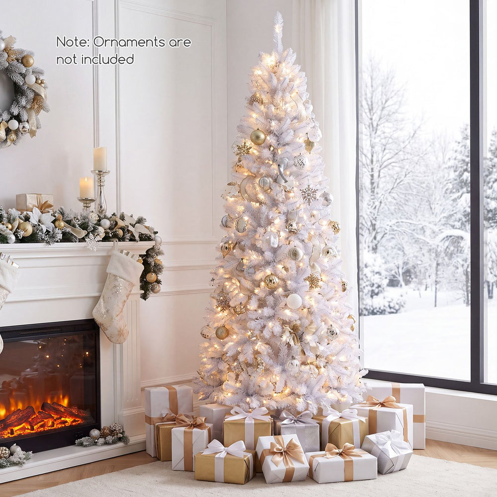 7-foot pre-lit hinged pencil Christmas tree in white with 300 LED lights, perfect for creating a magical holiday ambiance.