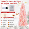7 feet pre-lit snow flocked pencil Christmas tree with 300 warm white LED lights and 8 lighting modes for festive ambiance.