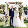 Wooden garden arch arbor in rustic brown, perfect for climbing plants and wedding entries, featuring elegant grid.