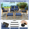 7-piece outdoor conversation set featuring a stable acacia wood frame and navy cushions, perfect for backyard.