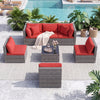 7-piece PE rattan patio set with red cushions and glass table, ideal for outdoor relaxation by the poolside.