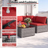 Red cushions and pillows with zippered covers on a 7-piece PE rattan patio set for outdoor comfort and style.