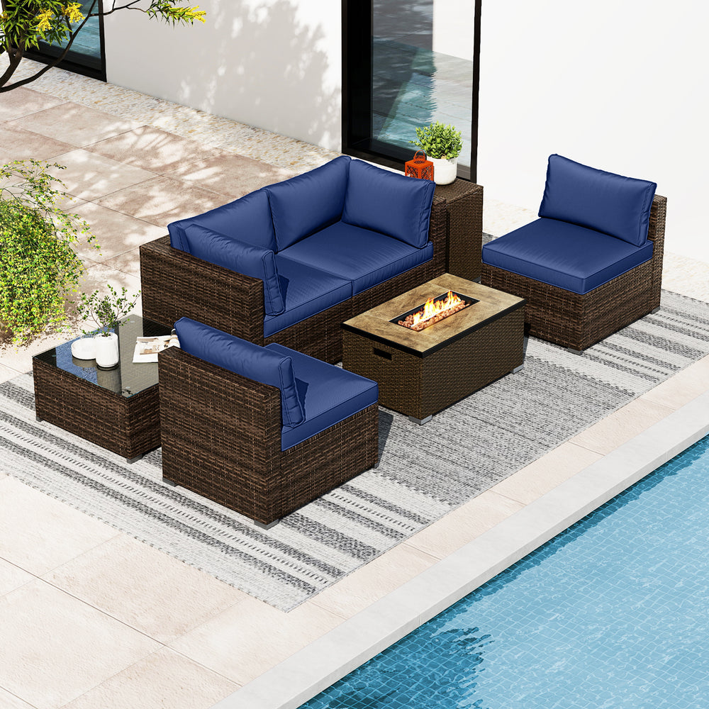 7-piece outdoor furniture set featuring navy cushions and a 32-inch fire pit table, perfect for patio relaxation.