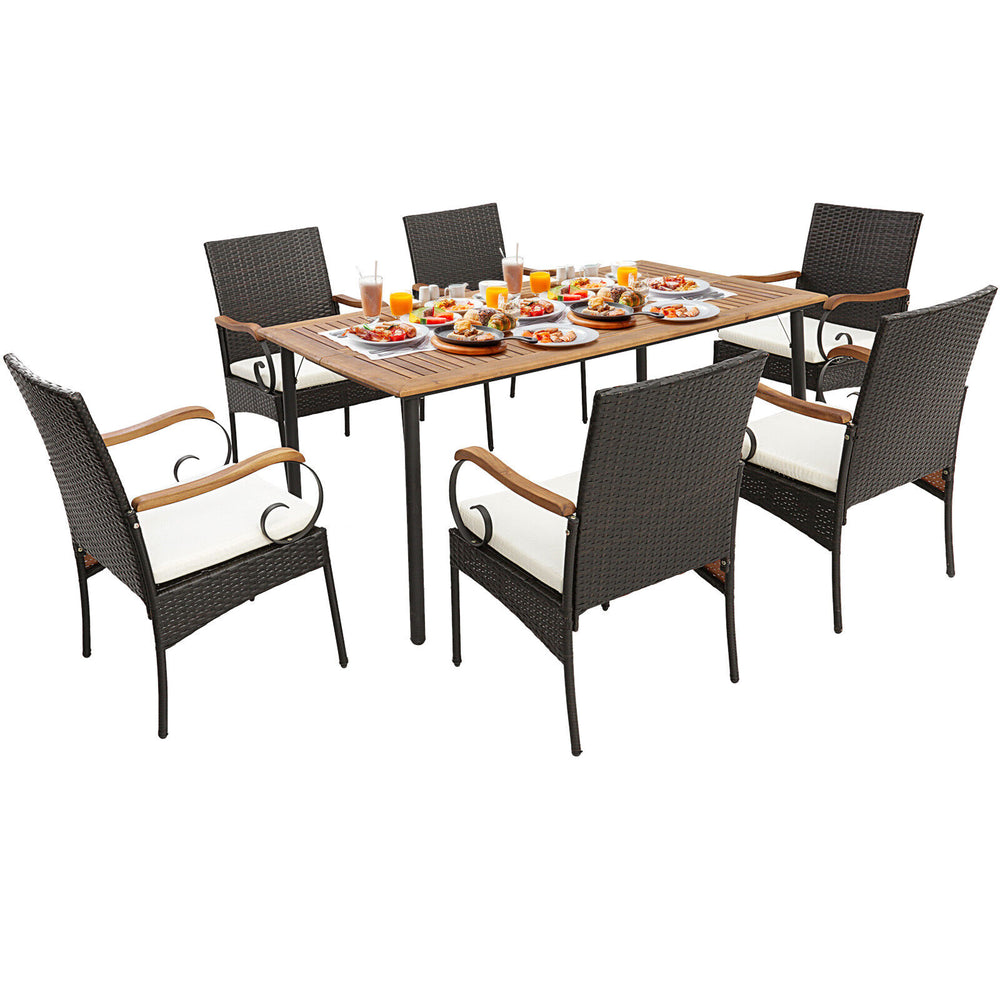 7-piece patio wicker dining set featuring acacia wood tabletop, detachable cushions, and umbrella hole for outdoor.